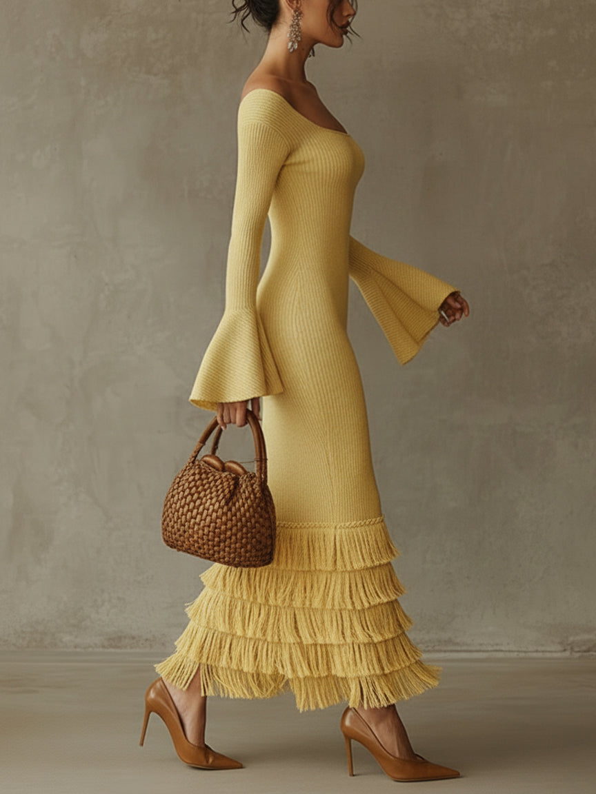 "Żółta Sukienka Bodycon z Odkrytymi Ramionami i Frędzlami" could be rewritten as "Żółta Sukienka Bodycon z Odkrytymi Ramionami i Stylowymi Frędzlami".